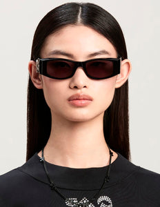 Lente Solar PALM ANGELS ANGEL Negro